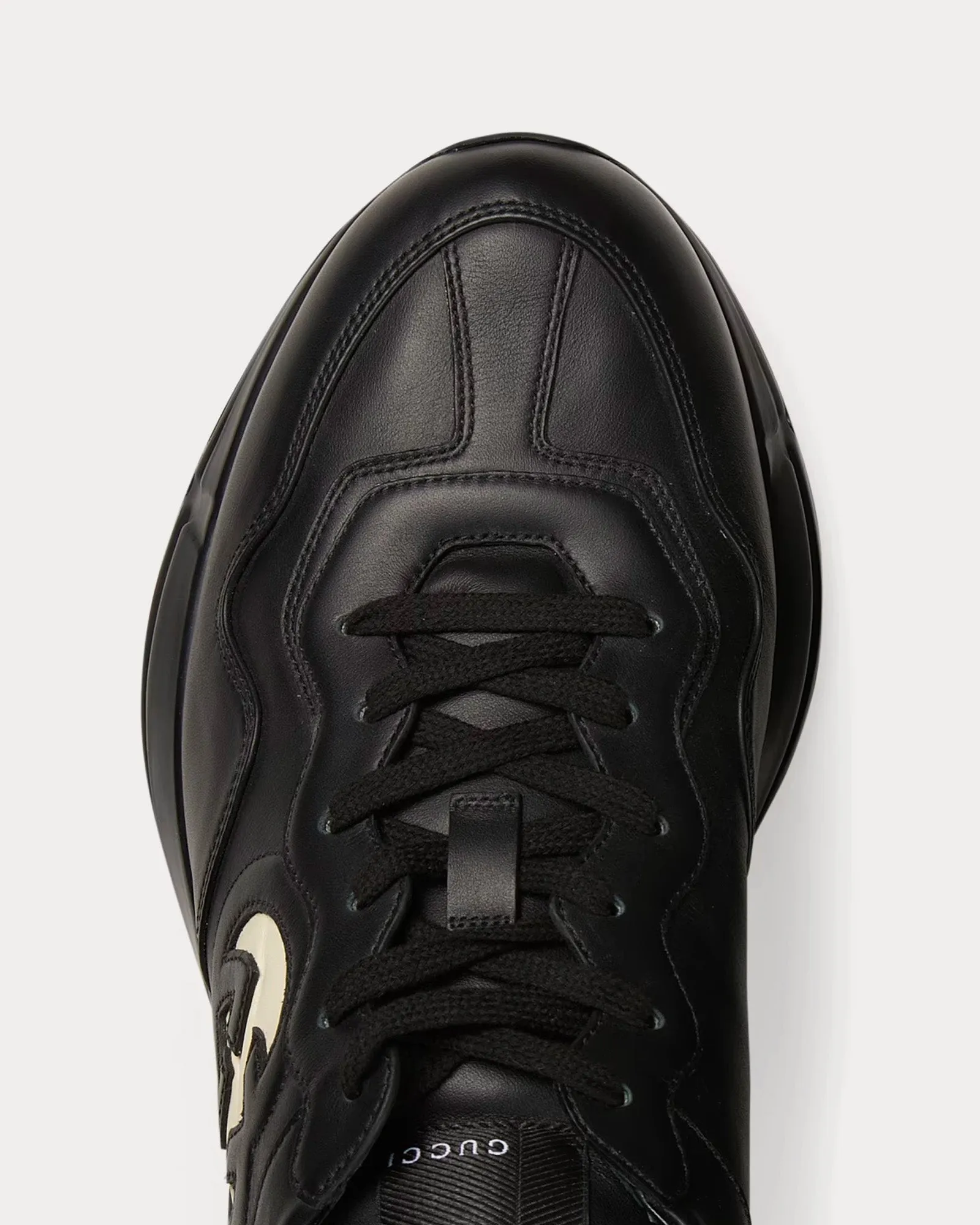 Rhyton Interlocking G Black Low Top Sneakers